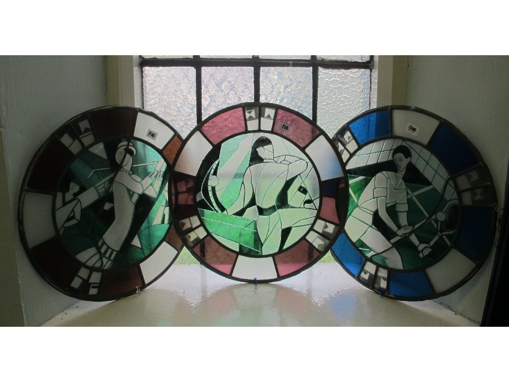 Appraisal: Three Art Deco stained and etched glass panels depicting golf