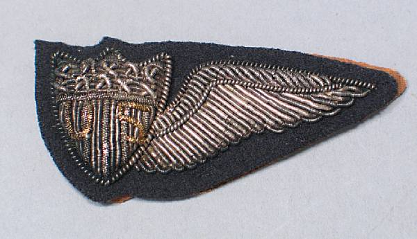 Appraisal: A World War era embroidered Junior and Reserve aviator's half-wing