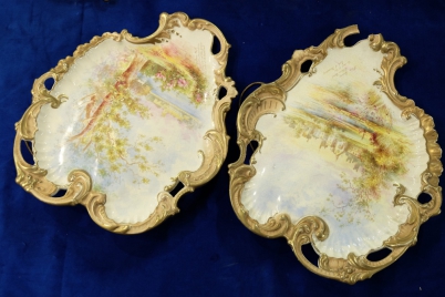 Appraisal: Pair Fielding's Crown Devon rococo wall plaques hand painted with