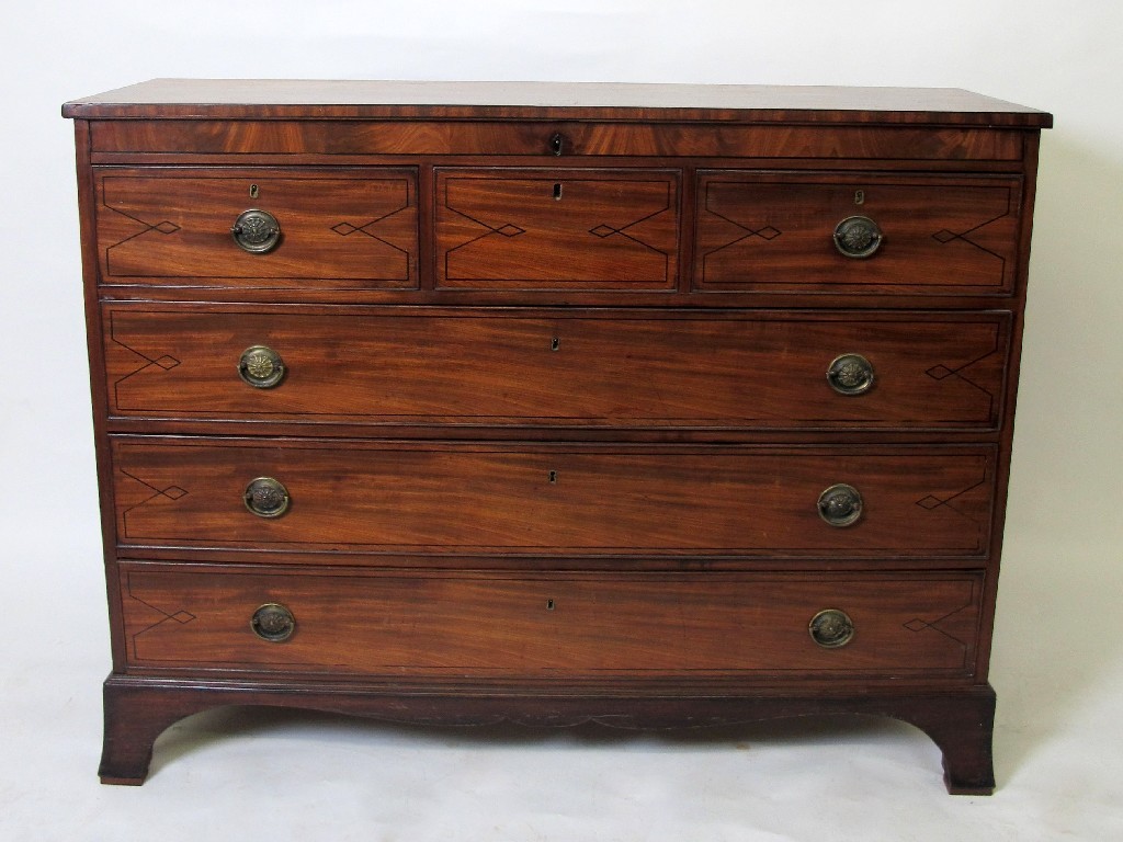 Appraisal: A Georgian mahogany chest with three over three drawers inlaid