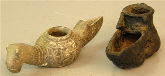 Appraisal: Two stone ware Afghan oil lamps one in the from