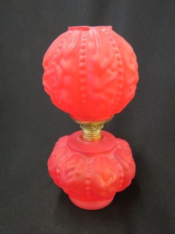 Appraisal: Victorian Miniature Oil Lamp satin red puffy matching shade