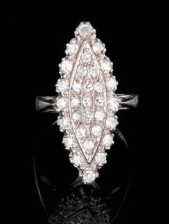 Appraisal: A VINTAGE DIAMOND COCKTAIL RING Thirty-one carat diamonds in an