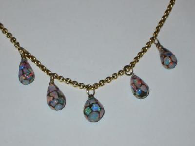 Appraisal: A VICTORIAN OPAL BEAD NECKLACE comprising five pear shape mosaic