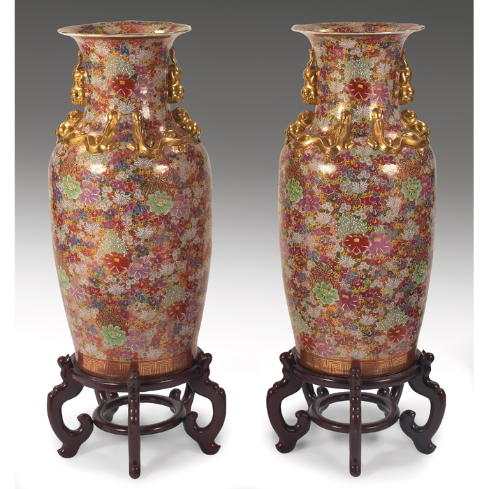 Appraisal: Asian vases pair large form with colorfullypainted flowers applied gold