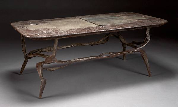 Appraisal: An unusual Modernist slate mounted patinated bronze table last quarter