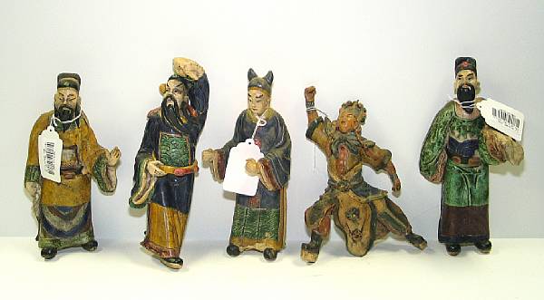 Appraisal: Five polychrome glazed ceramic roof tile figurines Including three officials