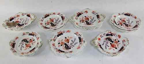 Appraisal: An ironstone dessert service of twenty pieces painted chrysanthemums and