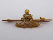 Appraisal: A yellow metal tests carat gold Royal Artillery regimental badge