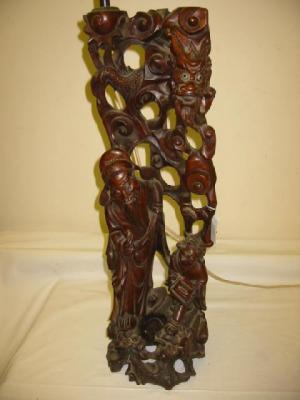 Appraisal: AN ORIENTAL ROOTWOOD FIGURAL TABLE LAMP carved as a male