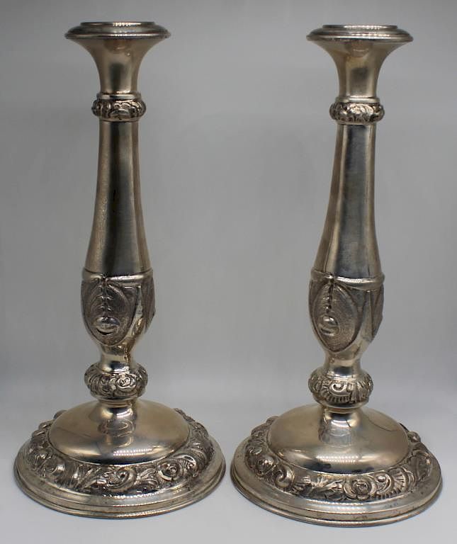 Appraisal: SILVER Pair of Silver Shabbat Candlesticks With repousse floral and