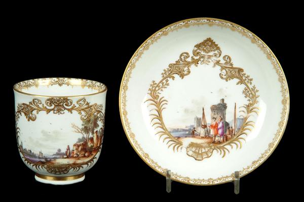 Appraisal: A Meissen cup and saucer painted with figures within European