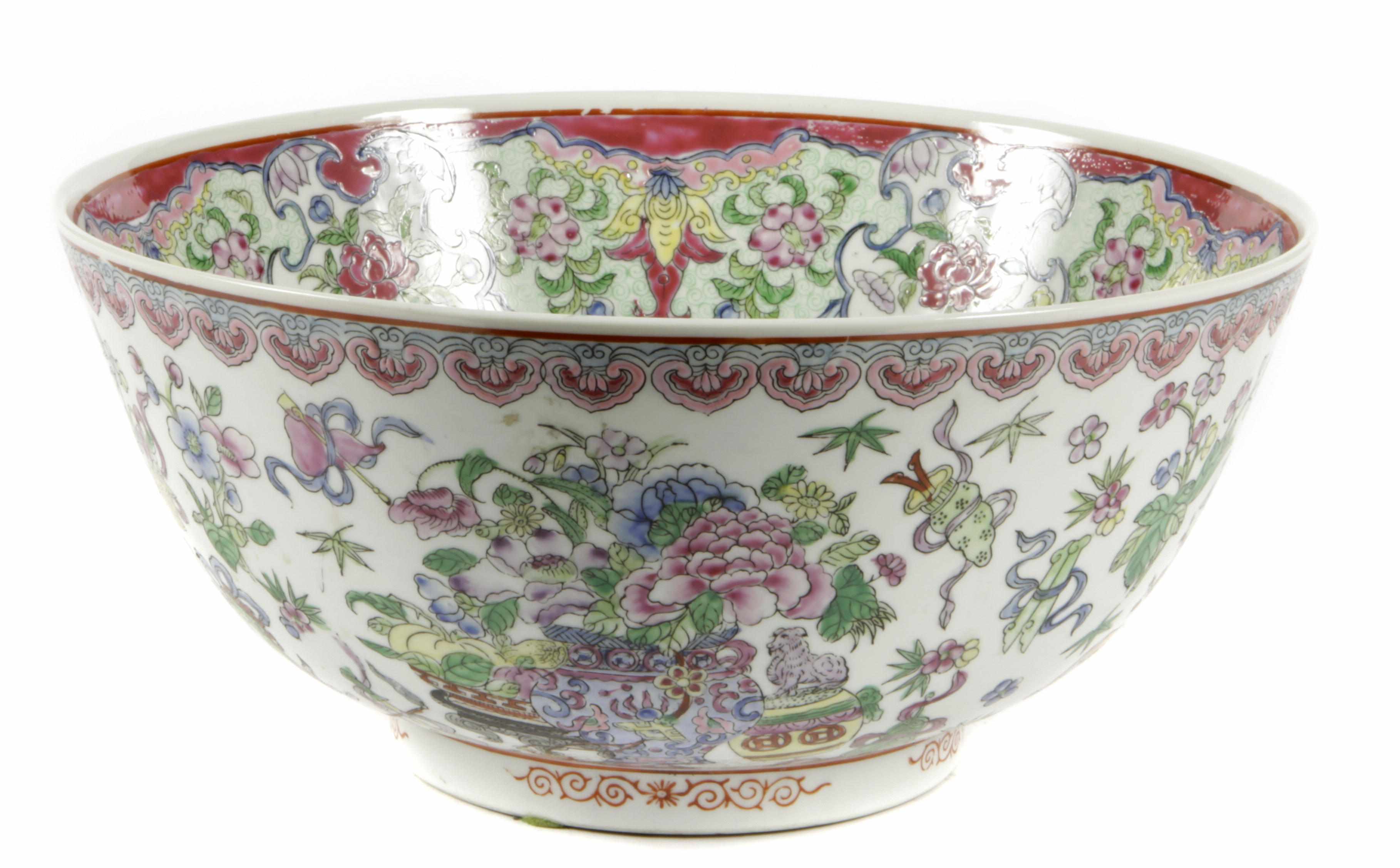 Appraisal: A Chinese porcelain bowl decorated with vases of peonies diameter