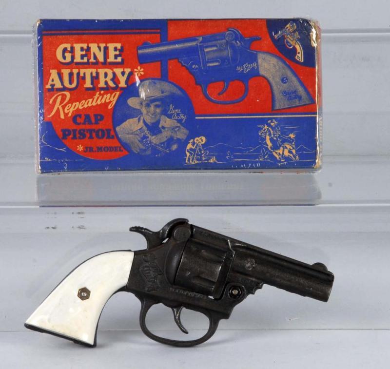 Appraisal: Cast Iron Gene Autry Cap Gun Description Right grip has