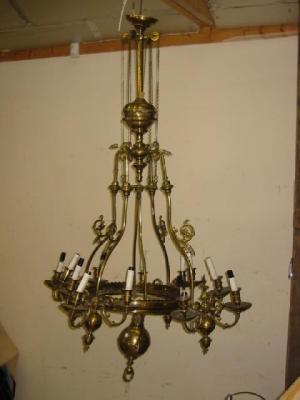 Appraisal: A VICTORIAN BRASS CHANDELIER the lobed edged circlet on shaped