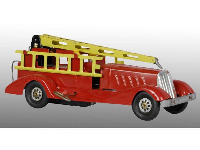 Appraisal: Marx Pressed Steel Aerial Ladder Fire Truck Toy Description Includes