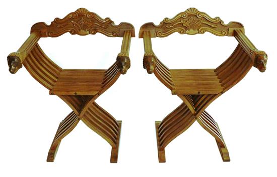 Appraisal: Pair of Savonarola-type chairs th C oak lions head carving