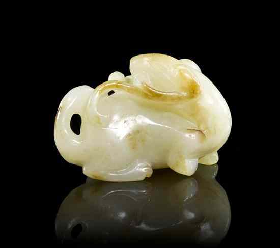 Appraisal: A Carved Jade Toggle of a pale celadon stone with