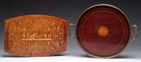 Appraisal: TWO INLAID TRAYS Inlaid mahogany round tray with brass gallery