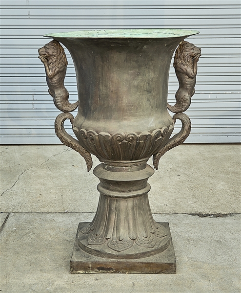 Appraisal: Large European-style metal urn with lion handles x approx Condition