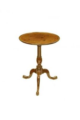 Appraisal: A mahogany tripod table the circular dished top on a