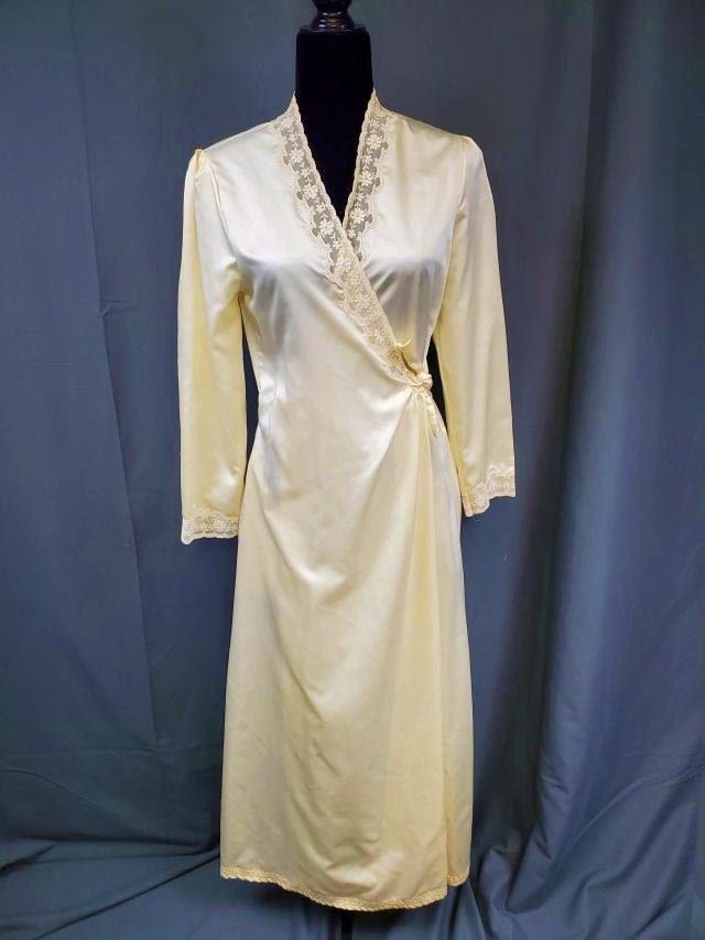 Appraisal: Vintage Christian Dior robe ivory color with lovely lace embellishment