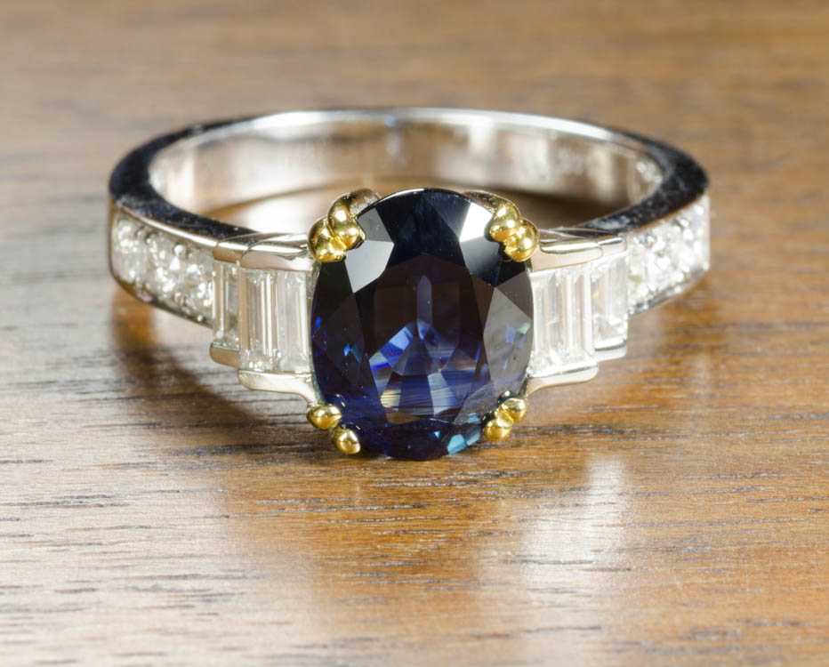 Appraisal: SAPPHIRE DIAMOND AND FOURTEEN KARAT GOLD RING The white and