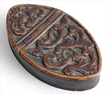 Appraisal: DUTCH BAROQUE CARVED WOOD AND LACQUER SNUFF BOX Of pointed