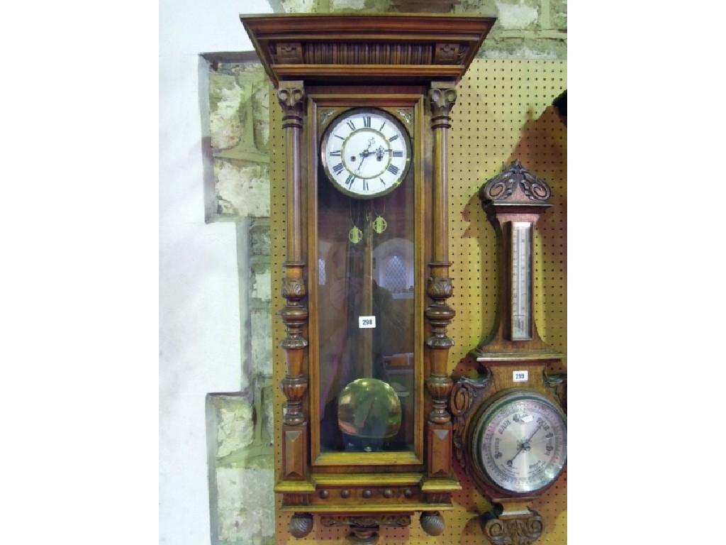 Appraisal: A th century Vienna regulator wall clock with carved column