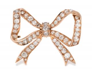 Appraisal: A Victorian Rose Gold and Diamond Bow Pendant dwts A