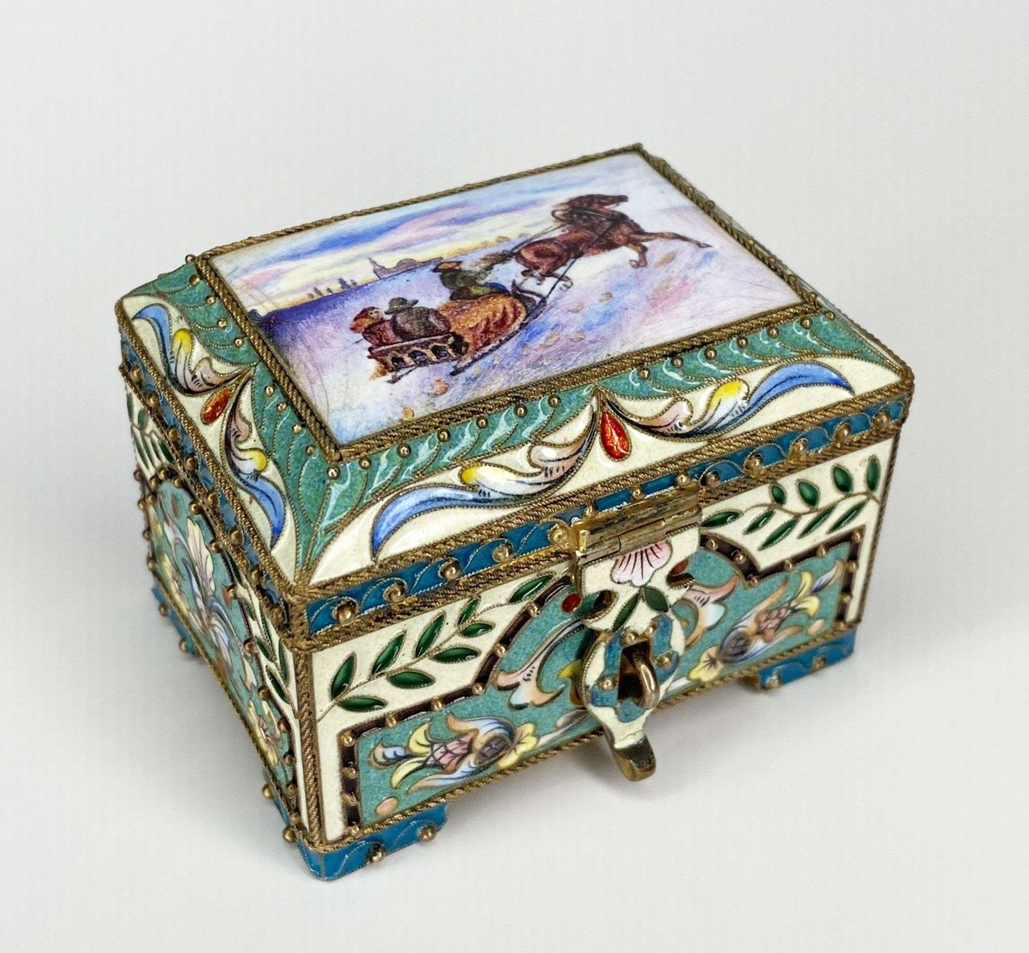 Appraisal: Russian Silver-Gilt and Enamel Casket with Sleigh Scene tall at