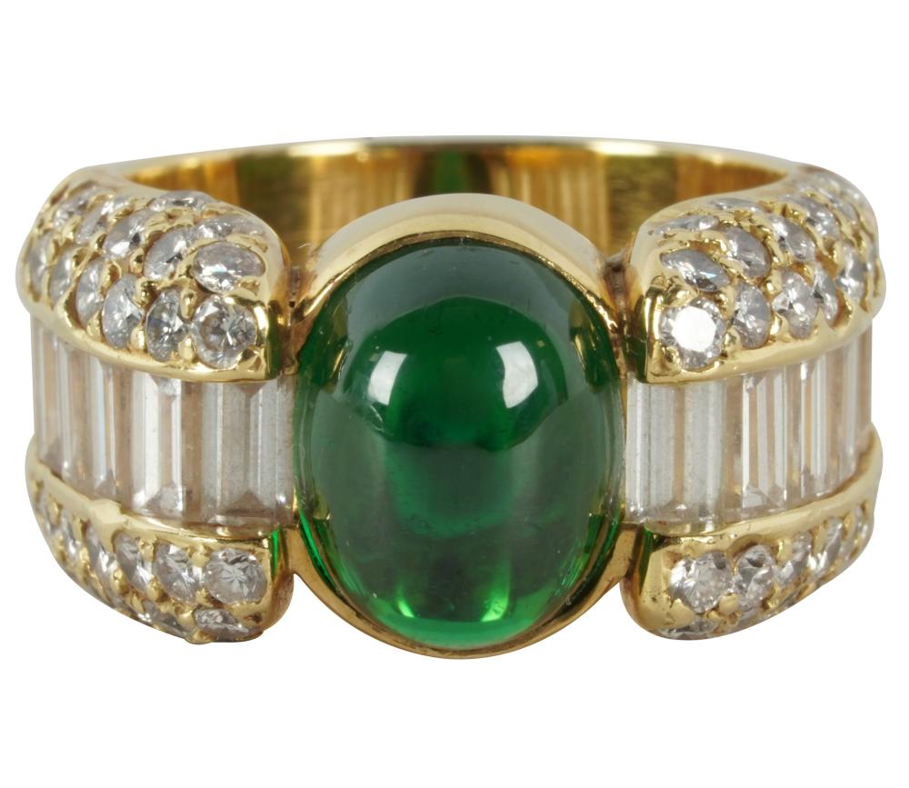 Appraisal: KARAT YELLOW GOLD DIAMOND TSAVORITE GARNET RINGcentering one oval cabochon