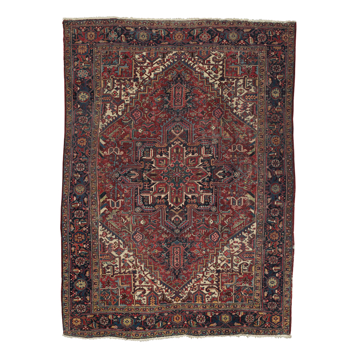 Appraisal: Iranian rug c stylized floral design on a red field