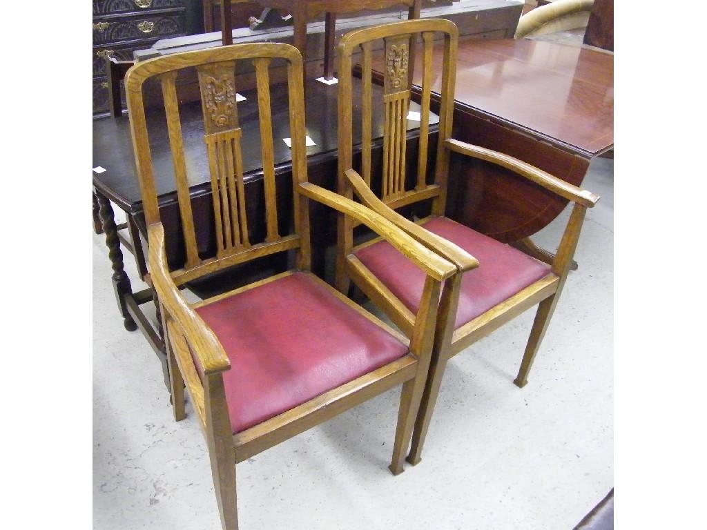 Appraisal: Pair of oak Arts and Crafts style dining chairs with