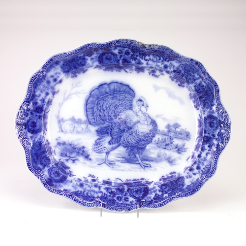 Appraisal: Large Flow Blue platter decorated with turkey in landscape Repairs