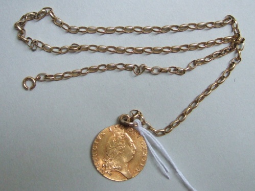 Appraisal: A George III spade guinea fitted with a pendant mount