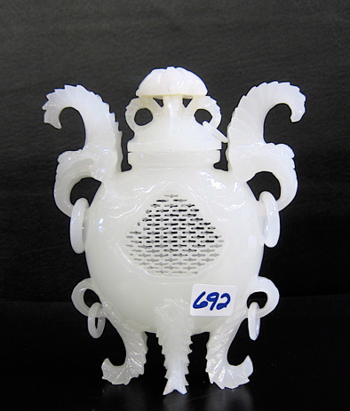 Appraisal: CHINESE WHITE JADE URN having reticulated body with bale carved