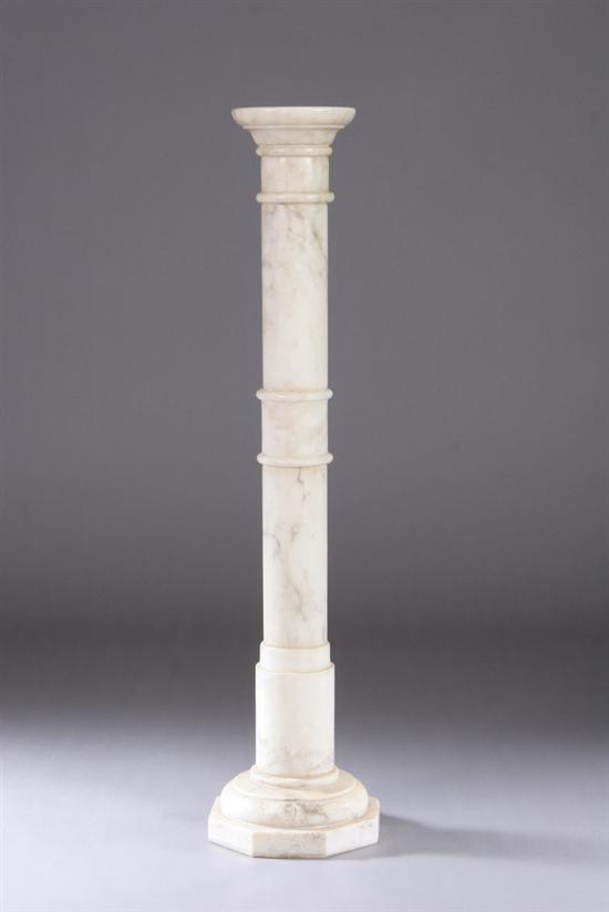 Appraisal: VICTORIAN MARBLE PEDESTAL Late th century Ring-turned column on elongated