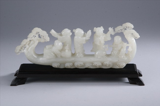 Appraisal: CHINESE WHITE JADE FIGURAL GROUP Finely carved to depict children