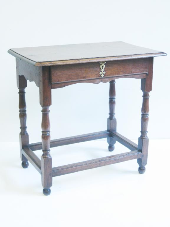 Appraisal: An antique oak Side Table fitted single drawer above shaped