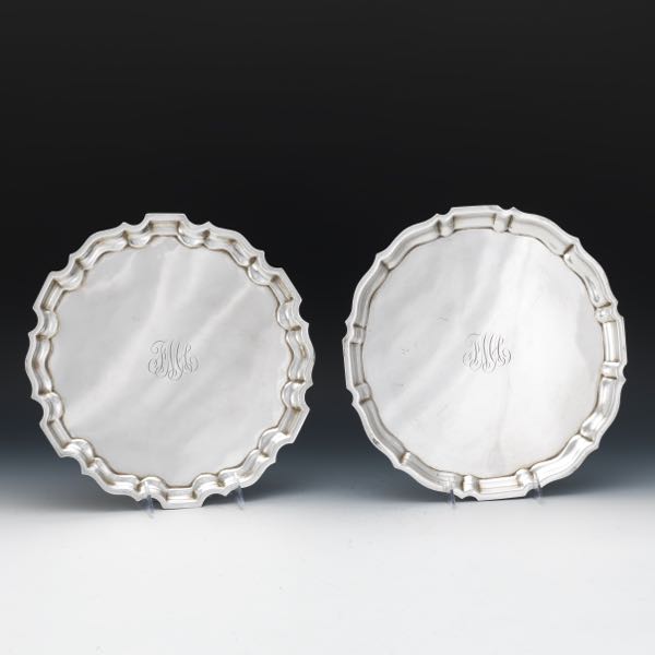 Appraisal: TWO LARGE STERLING SILVER SALVERS BY GORHAM AND GRAFF WASBOURNE