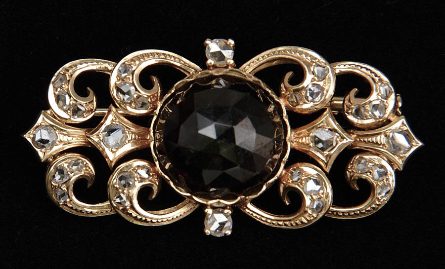 Appraisal: GARNET AND DIAMOND BROOCH Very lovely kt yellow gold brooch