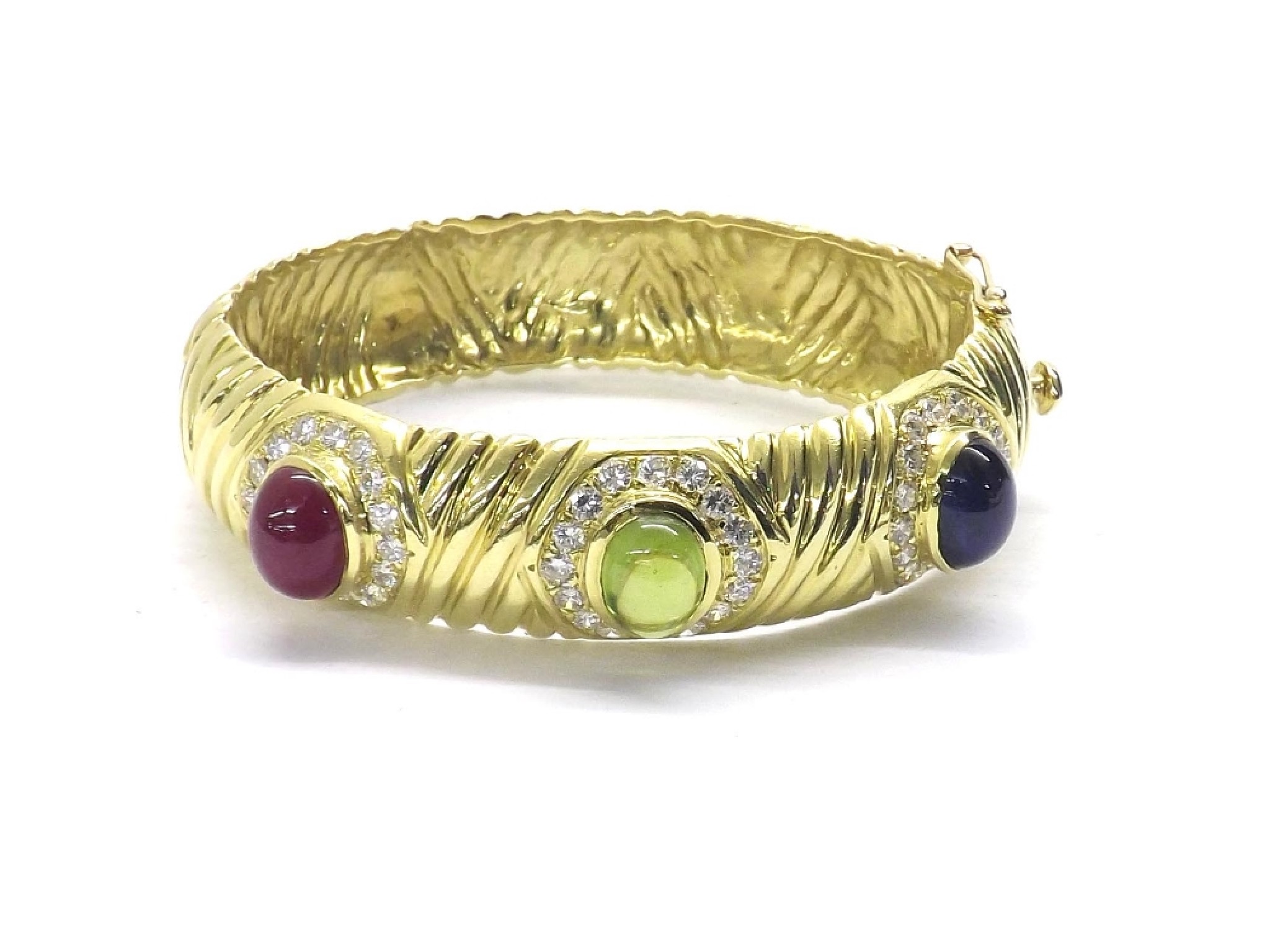 Appraisal: Unusual good ct yellow gold hinged bangle set with ruby