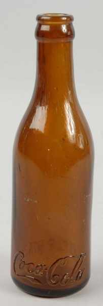 Appraisal: Amber Philadelphia PA Coca-Cola Bottle Description Circa Script logo at