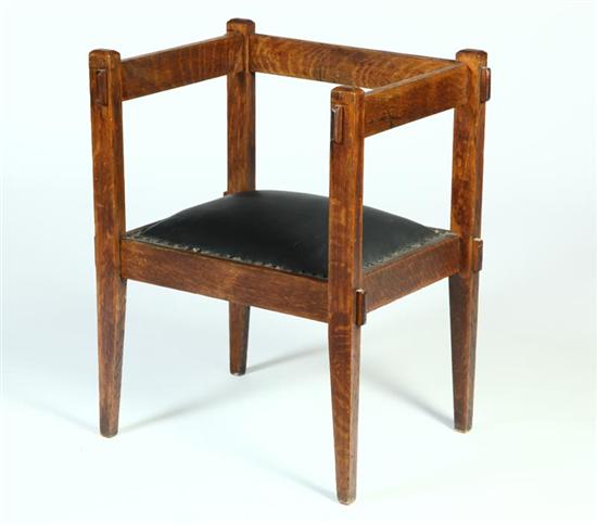 Appraisal: ARTS CRAFTS ARMCHAIR American early th century quarter sawn oak