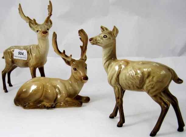 Appraisal: Beswick Lying Stag Standing Stag and Doe