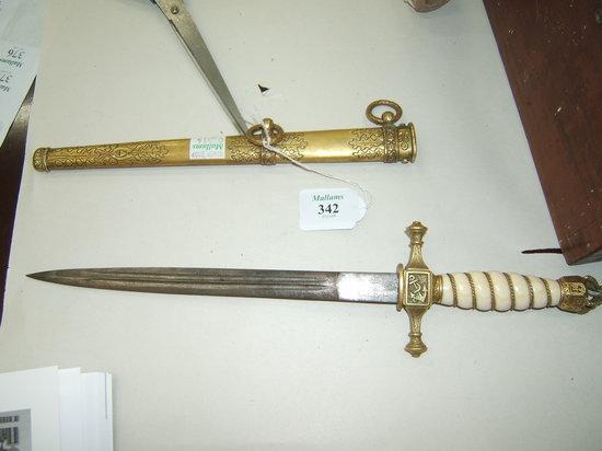 Appraisal: A NAVAL CEREMONIAL DAGGER with gilt metal scabbard coronet pommel