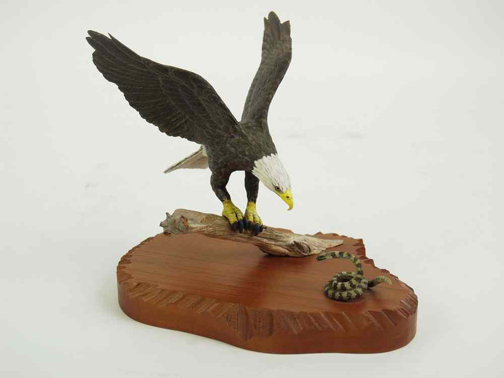 Appraisal: SCULPTURE - Hand carved and painted miniature Bald Eagle with