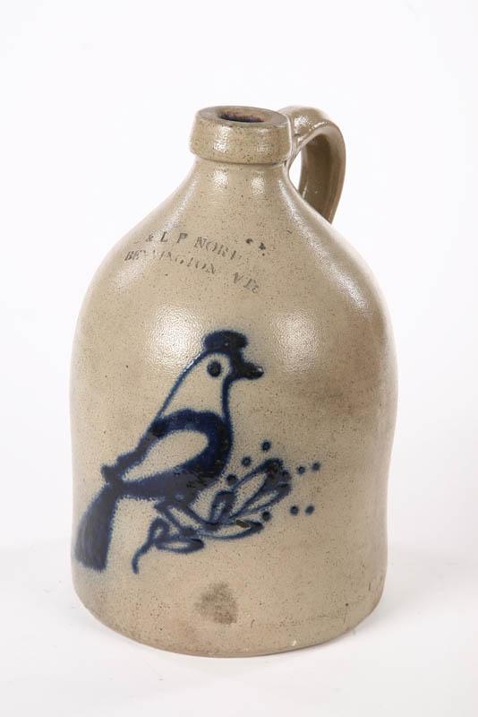 Appraisal: STONEWARE JUG A Vermont stoneware jug with cobalt bird decoration