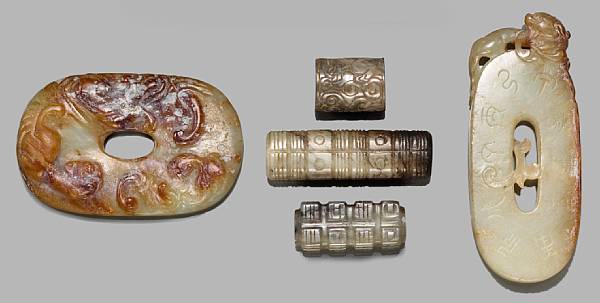 Appraisal: A group of five small carved jade ornaments Qing Dynasty